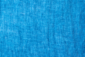 The texture of the linen fabric blue, blue crumpled linen texture