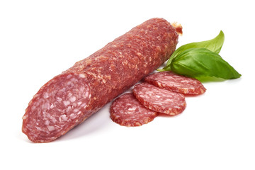Smoked salami sausage with basil, dried meat, close-up, isolated on white background