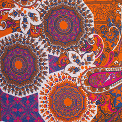 paisley pattern textiles red-brown color fabric texture