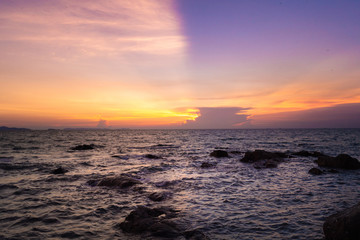 Fototapeta na wymiar sea sunset with dramatic clouds