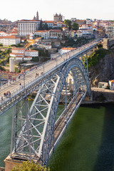 Aerial view of Dom Luis I Bridge across Douro River, the famous postcard of Porto, Portugal