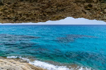 Magnificent view of the horizon from a cave on the shores of the Mediterranean Sea.