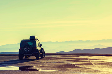 Fototapeta premium Vehicle adventure car on the top mountain