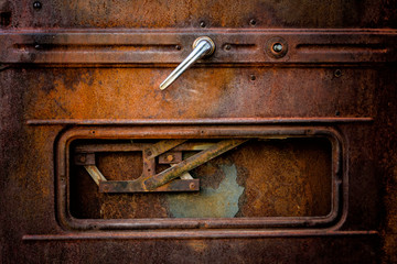 Rusty open door car