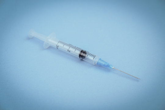 Suringe on a background