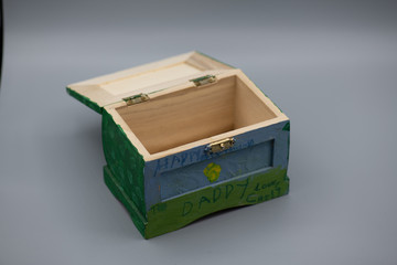 green gift box on grey background