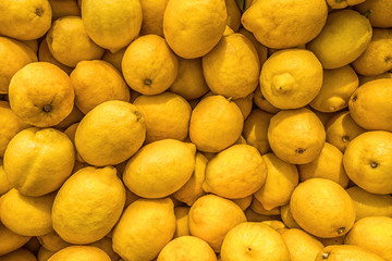 fresh juicy lemons on the market