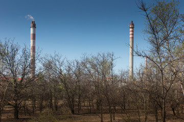 Obraz premium High chimneys of zinc and lead foundry