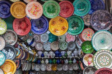 Traditional arabic handcrafted, colorful decorated plates shot at the market in Marrakesh, Morocco.