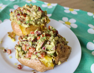 Baked potato with avocado stuffing