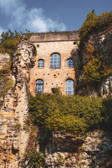 Fototapeta premium Old architecture between natural rocks in Luxembourg city old town