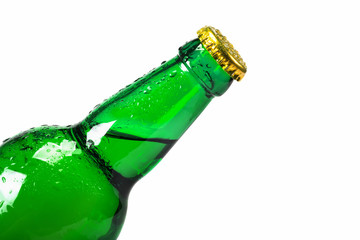 A glass bottle, a close-up with dripping water drops isolated on the white background.