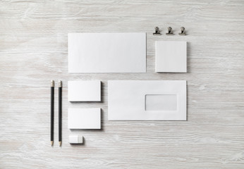 Blank stationery set on light wooden background. Corporate identity template. Branding mock-up....