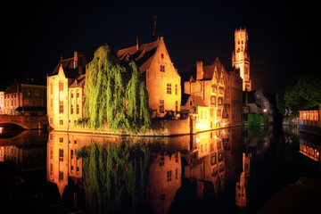 Medieval City Centre, UNESCO World Heritage Site, framed by Rozenhoedkaai canal at night, Bruges, West Flanders, Belgium, Europe