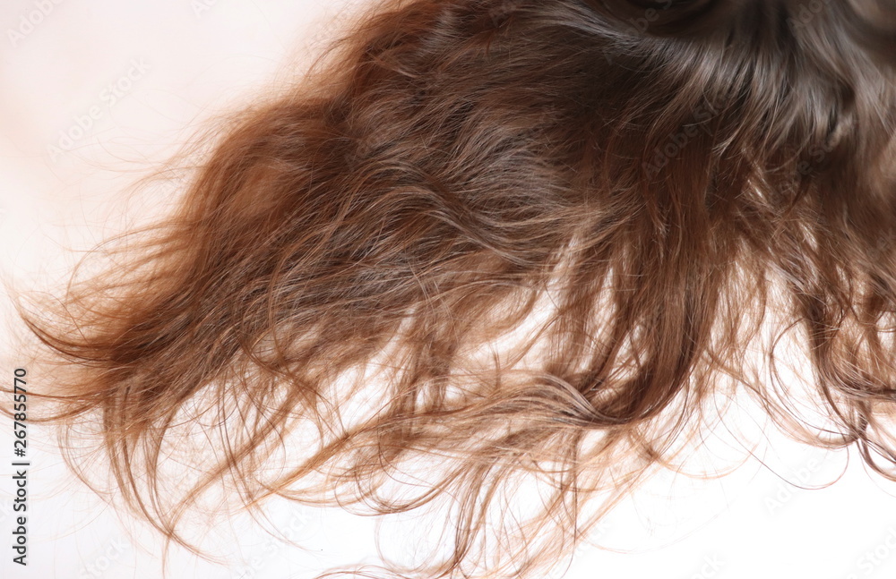 Wall mural Long, wavy brown hair. Teenage girl. 