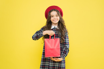 Shopping and purchase. Black friday. Sale discount. Shopping day. Little french lady adore shopping. Birthday girl. Favorite brands hottest trends. Girl with shopping bag. Explore fashion industry