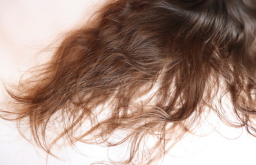 Naklejka premium Long, wavy brown hair. Teenage girl. 