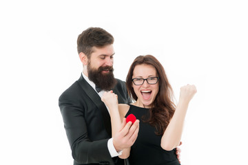 Long awaited proposal. Couple celebrate anniversary relations. Hope she likes ring. Proposal of marriage concept. Man hold little red box romantic proposal. Will you marry me. About to say yes