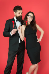 love date and romance. formal couple. business meeting. valentines day heart. bearded businessman with lady on date. tuxedo man and elegant woman at formal party. sexy couple in love. best date ever