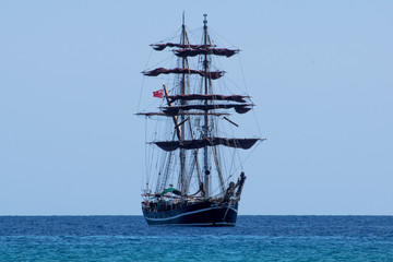Naklejka na ściany i meble Large sailing ship sailing on the sea of Sicily