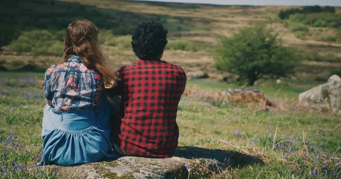 Young couple relaxing on the moor