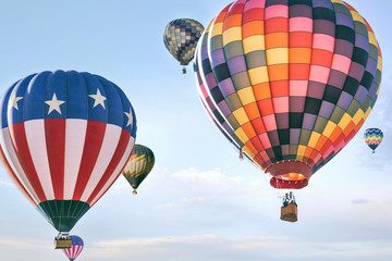Naklejka premium Colorful hot air balloons soaring in the sky