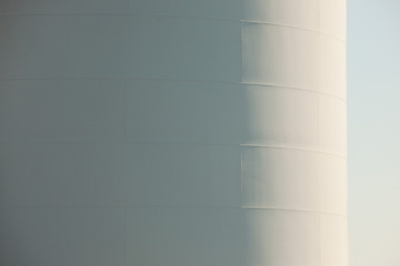 Close-up of large white Storage Tank with Shadow on it