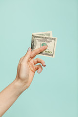 American Dollars Cash Money. 100 dollars banknotes in the background.