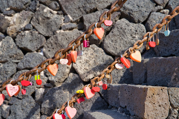 Old stone tower / wedding locks on the railing of the stairs, Lanzarote, Canary Islands, Spain