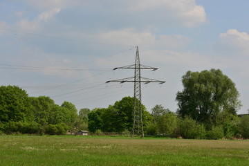Fototapeta na wymiar power pylon in germany on a sunny day