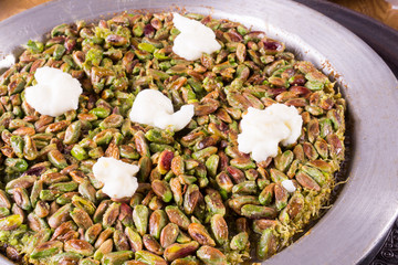 dessert kunefe, kunafa with pistachio close up