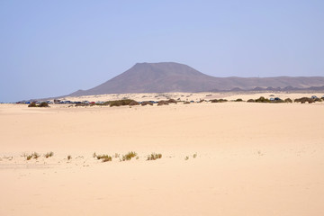 Fototapeta na wymiar Sand Dunes in National Park Corralejo, Fuerteventura.