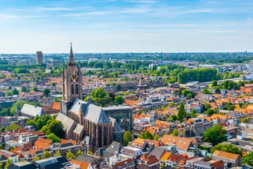 Fototapeten Aerial view of Oude Kerk church in Delft, Netherlands © dudlajzov