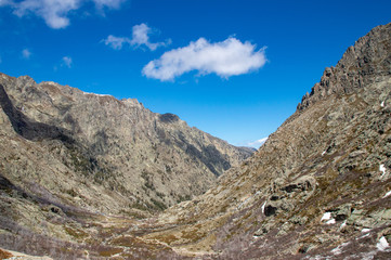 Obraz premium Rock peaks on the top of the Restonica gorge near the Melo Lake in Corsica, France.