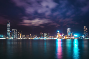 Hong Kong cityscape at night. - obrazy, fototapety, plakaty
