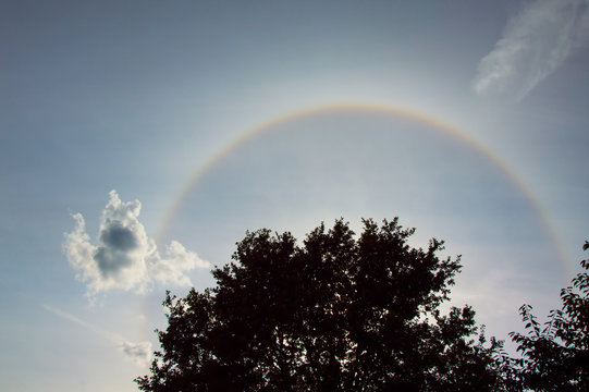 Wonderful solar halo with fluffy clouds, Sunny and holar