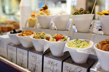 Outdoor stall with various sea food. Mediterranean street food.
