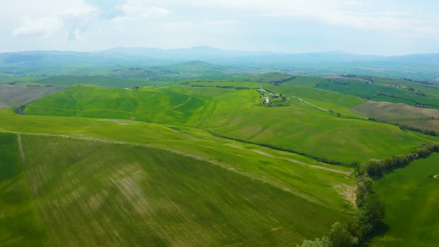 Aerial view of the Tuscany landscape in The Val d'Orcia, or Valdorcia, is a region of Tuscany, central Italy, which extends from the hills south of Siena to Monte Amiata.