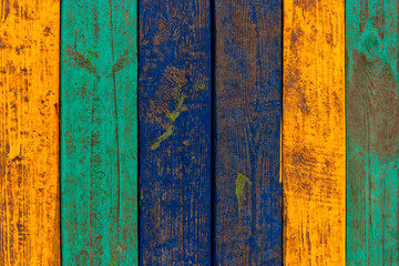 Multi colored shabby wood fence background