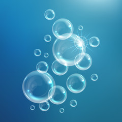 Realistic transparent floating soap bubbles. Design element for advertising booklet, flyer or poster
