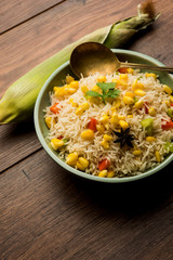 Corn Pilaf or Pulav made using boiled Maize seeds with rice and vegetables. selective focus