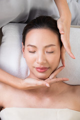 Ayurvedic Head Massage Therapy on facial forehead Master Chakra Point of Asian woman, Therapist Spa body woman hands treatment on customer to increase circulation release tension stress, isolated