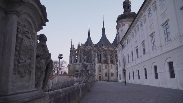 St. Barbara's Church in Kutna Hora, Czech Republic, panning right over statue, evening shot