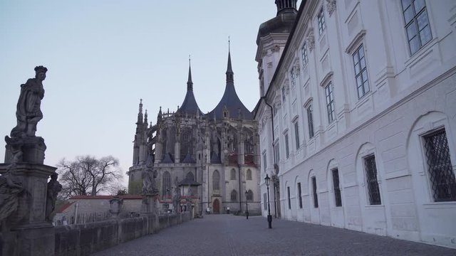 St. Barbara's Church in Kutna Hora, Czech Republic, walking back from it, smooth steady evening shot