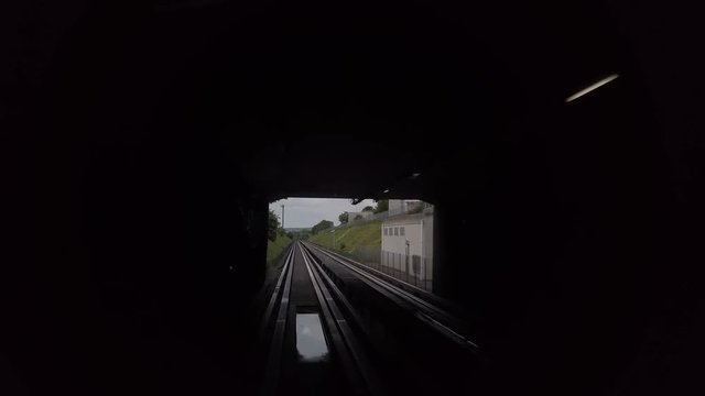 Subjective view of the driver of a train leaving a tunnel