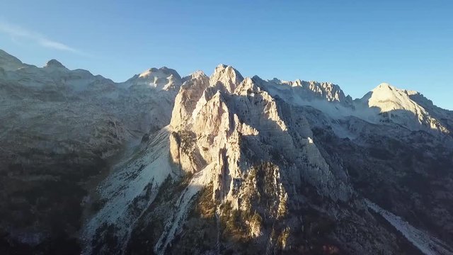 Mountaineering in the Alps whilst camping on a multi-day trek to the summit
