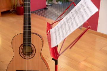 acoustic guitar on wooden ground