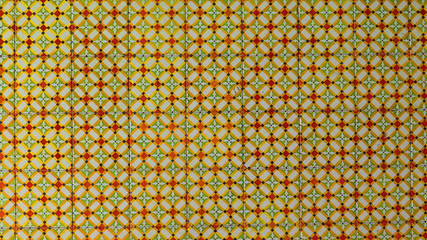 Green, yellow and orange small design tiles