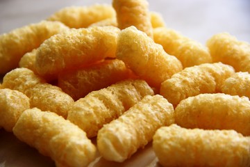 lot corn sticks without sugar and gluten on a gray table