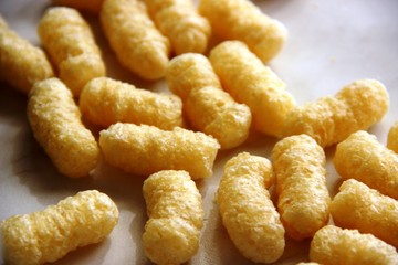 corn sticks without sugar and gluten on a gray table. food allergen concept, gluten free